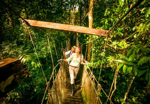 Walking in the supension bridge in Iquitos